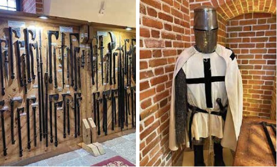 Der Waffensaal der Burg und eine originale Ritterrüstung